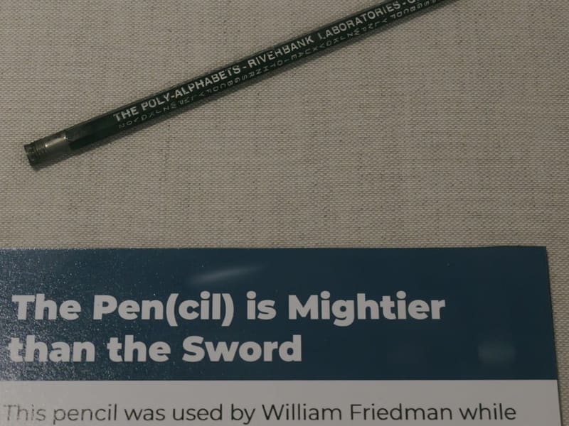 A pencil printed with poly-alphabet cipher characters on display