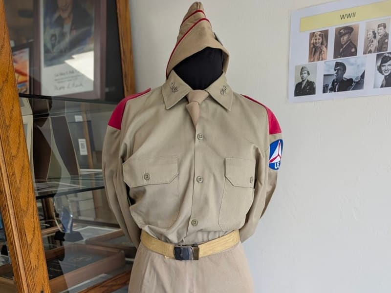 WWII-era Civil Air Patrol uniform on display indoors