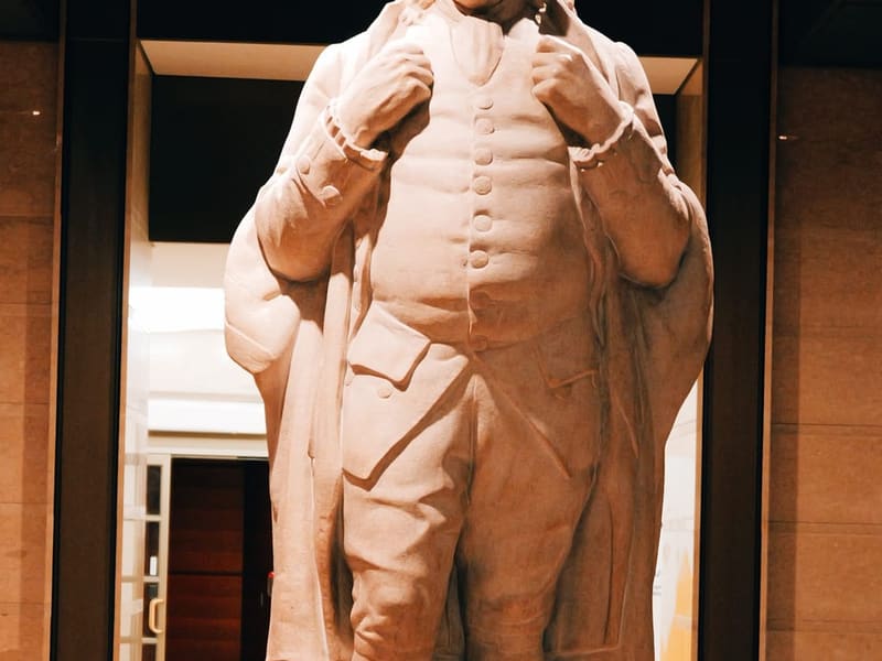 Marble statue of Benjamin Franklin, father of the U.S. Postal Service