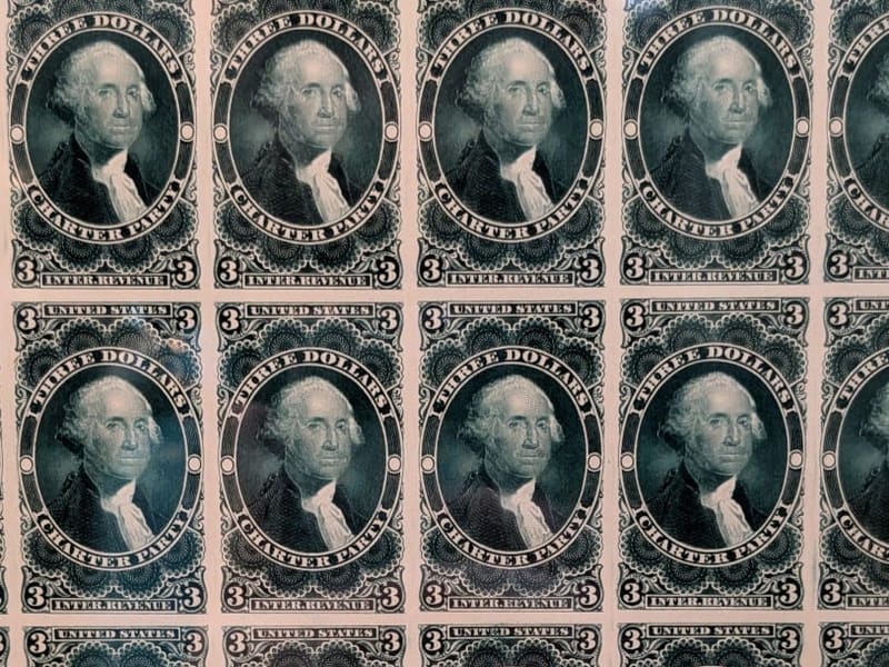 A full sheet of green three-dollar George Washington revenue stamps