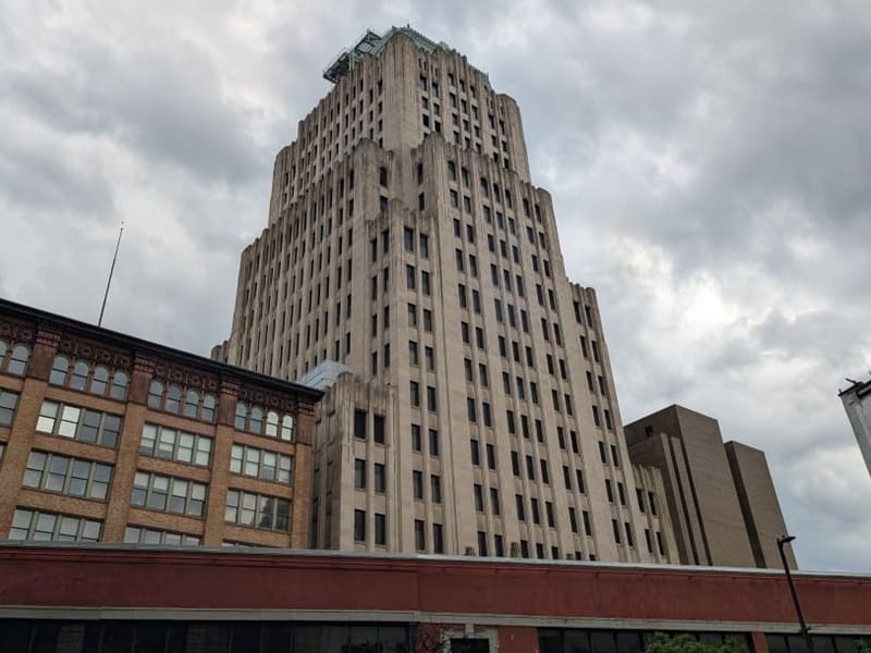 A downtown Cleveland Art Deco skyscraper under an overcast sky