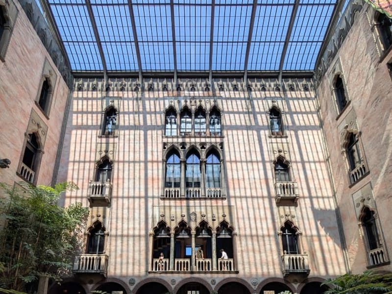 The glass-roofed Venetian courtyard garden at the Isabella Stewart Gardner Museum