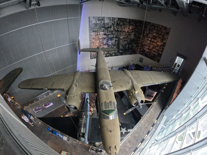 A WWII bomber suspended above the floor of the National WWII Museum