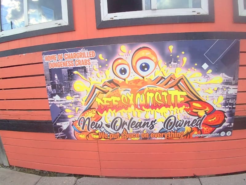 A colorful mural for Dee'sxquisite, a New Orleans chargrilled-crab spot: 'We put sauce on everything'