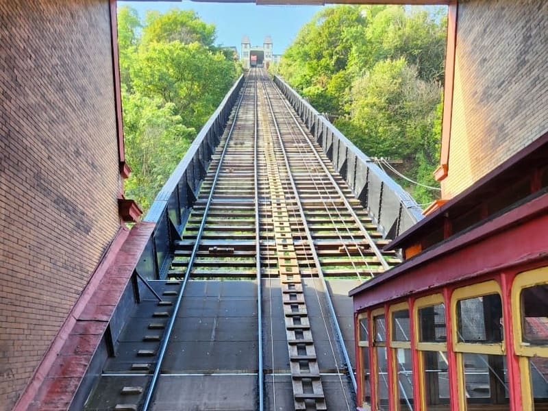 Looking up the Duquesne Incline track from the lower station, red car at right