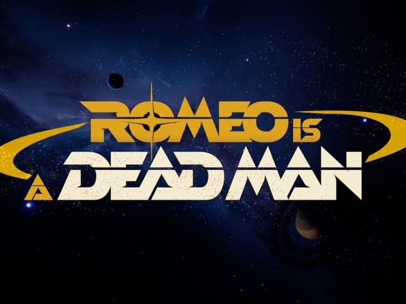 The gold 'Romeo Is a Dead Man' title logo set against a starfield.
