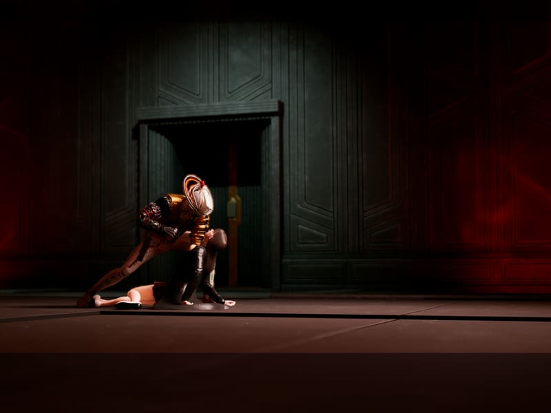Cinematic red-lit hall: Romeo kneels over a fallen body before a towering door.