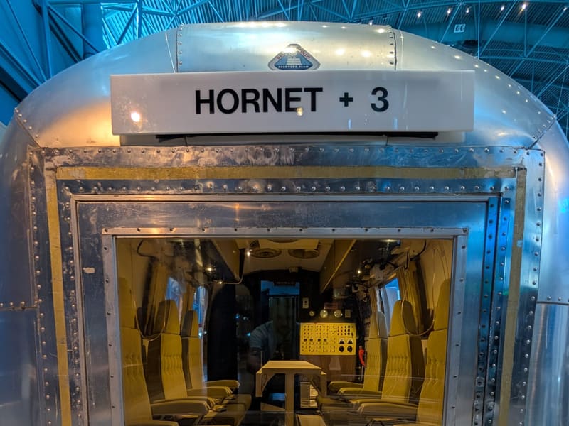 The Apollo Mobile Quarantine Facility, an Airstream trailer marked 'HORNET + 3'