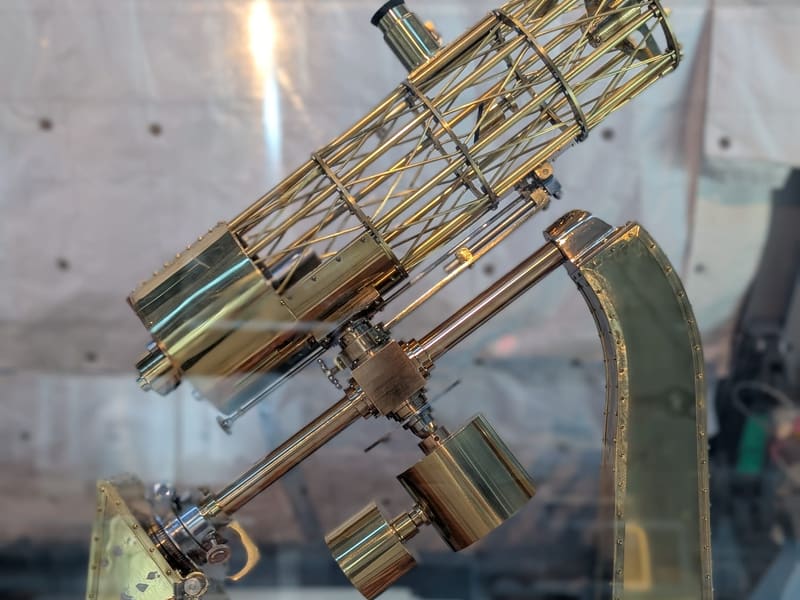 A polished brass Perkins reflecting-telescope demonstration model from the 1910s