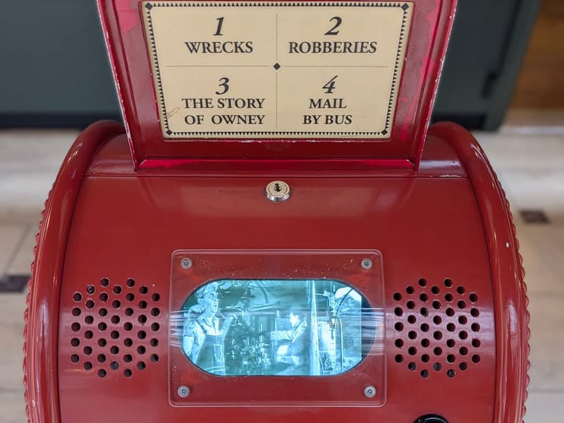 A red interactive exhibit titled 'The Story of Owney'