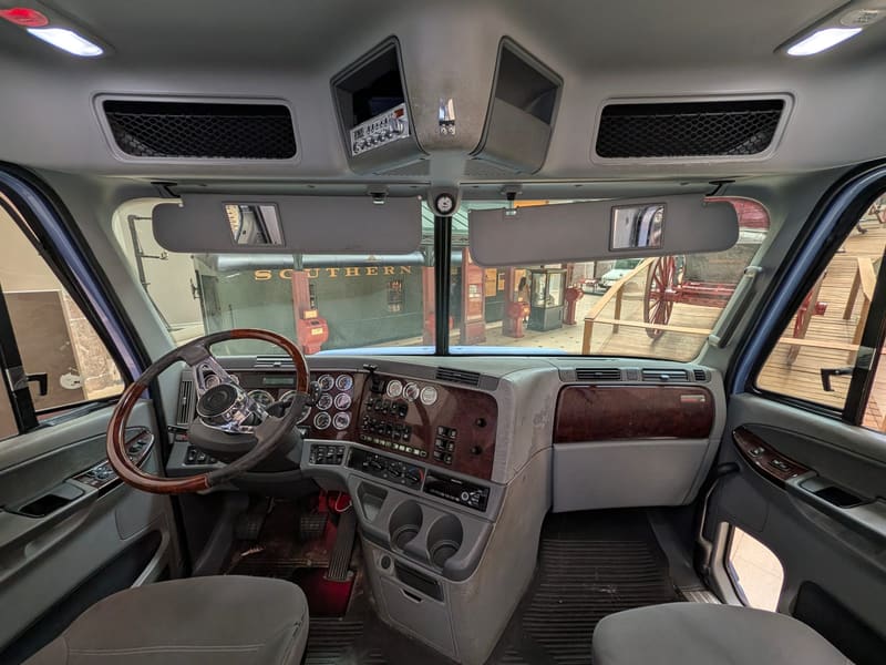 The cab interior of a modern mail delivery truck