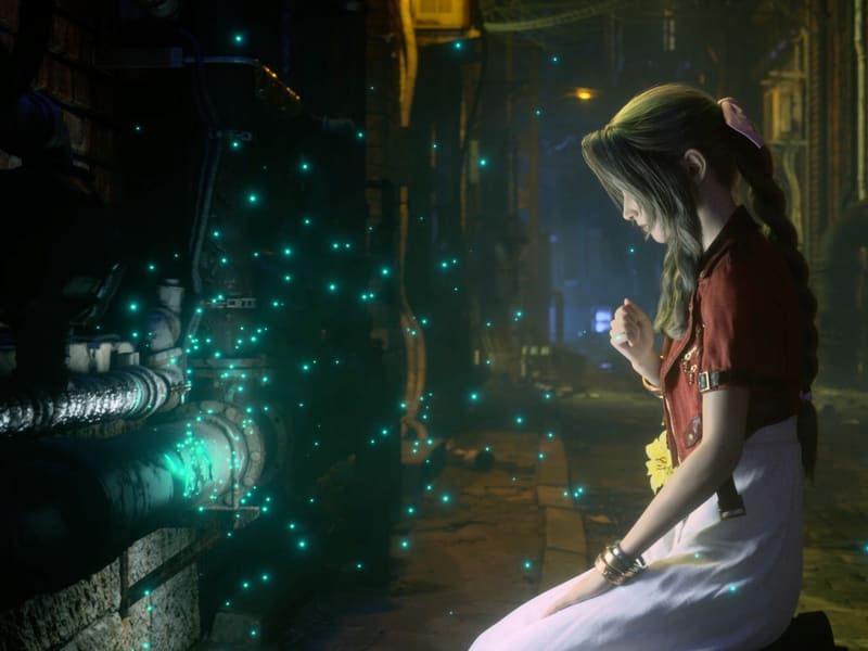 Aerith kneeling in a dark Midgar alley beside rusted machinery, surrounded by drifting green points of lifestream light.